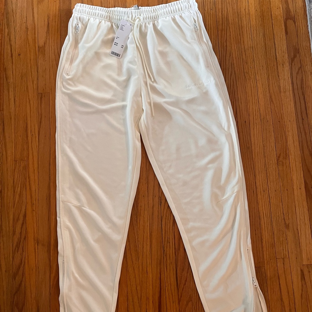 Standard Cloth men’s bone color joggers. New with tags from Urban Outfitters